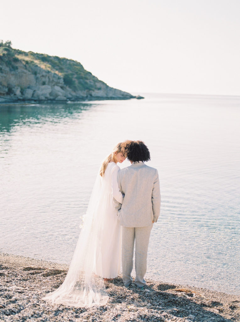 a romantic bride and groom wedding portrait on a Vancouver beach 