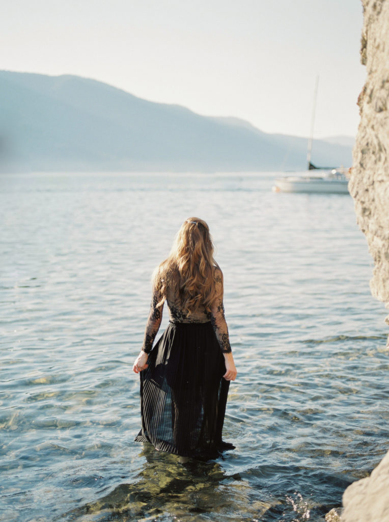 a bride walks into the Okanagan lake water in Kelowna 