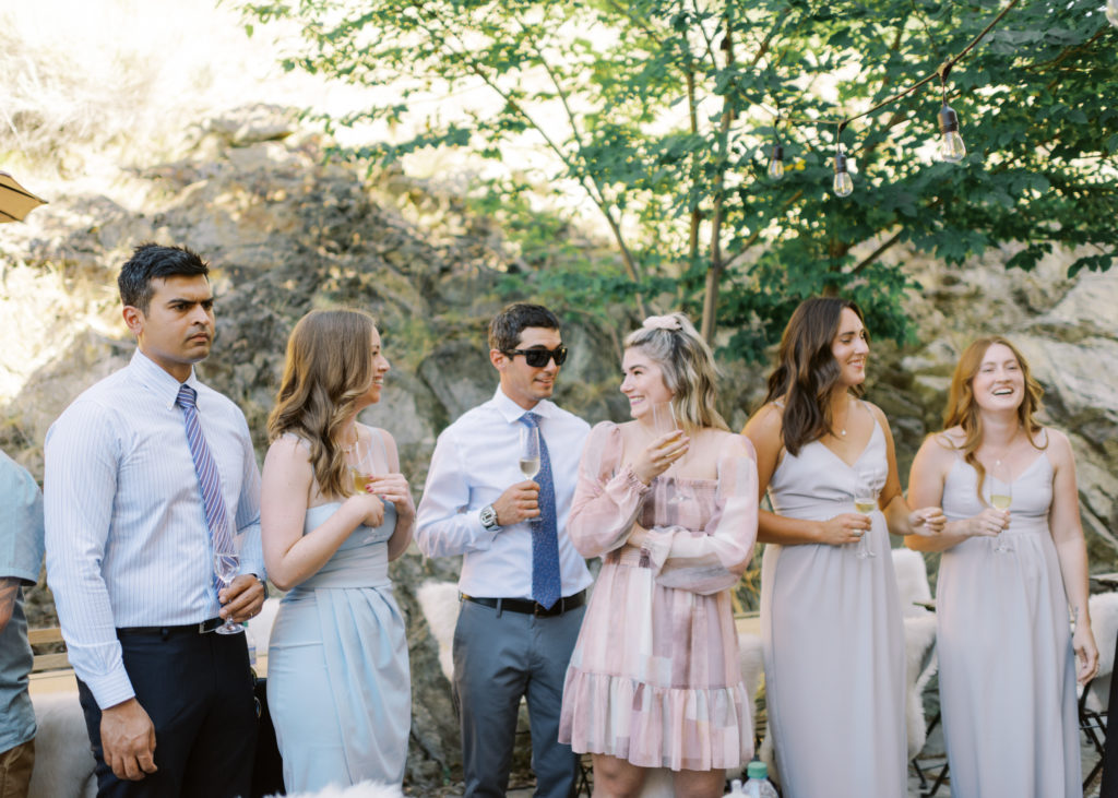 guests toast over champagne at a Kelowna private estate wedding 