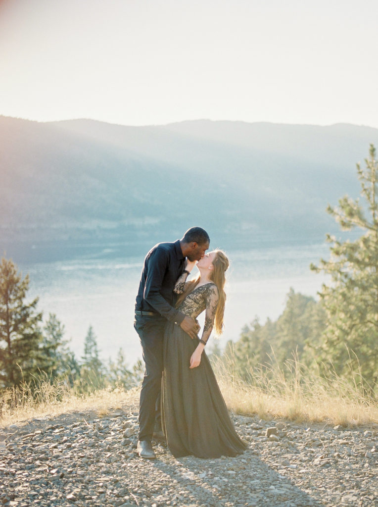 a bride and groom with a sunset Lakeview in Kelowna 