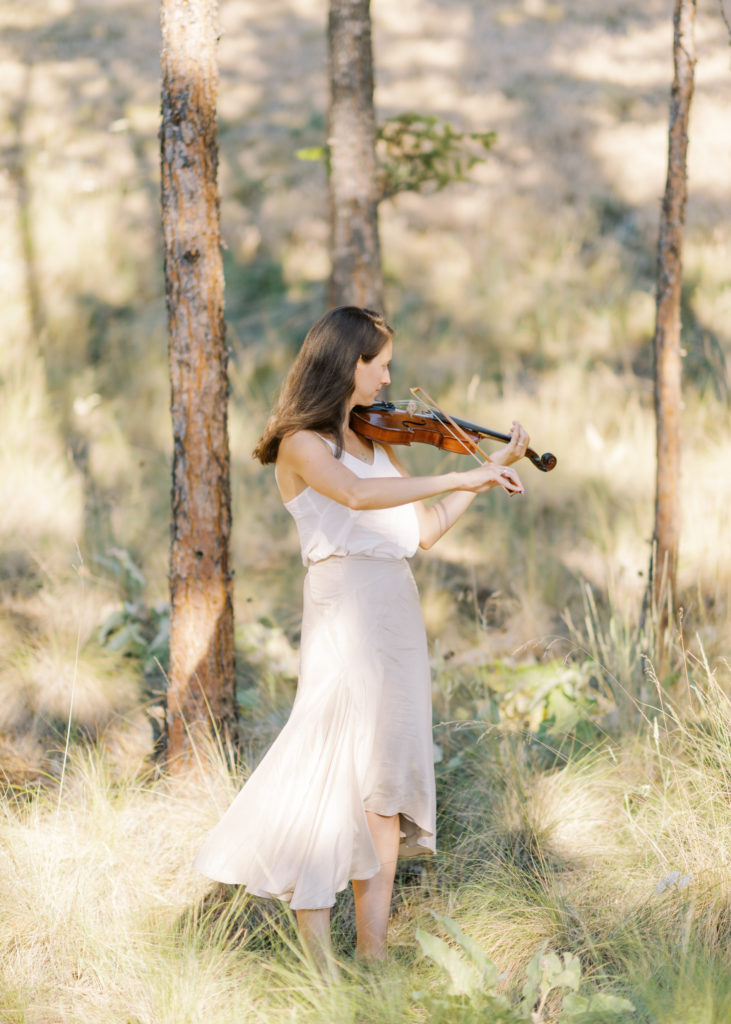a violinist playing for the ceremony at a Kelowna private estate wedding 