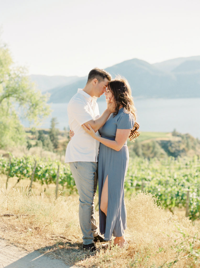 a couple in a vineyard at their Okanagan couples session 